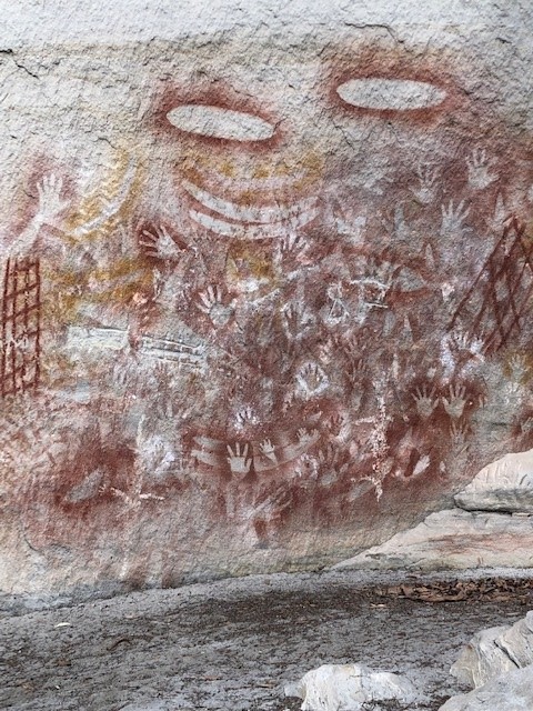 A phot of aboriginal cave drawings.